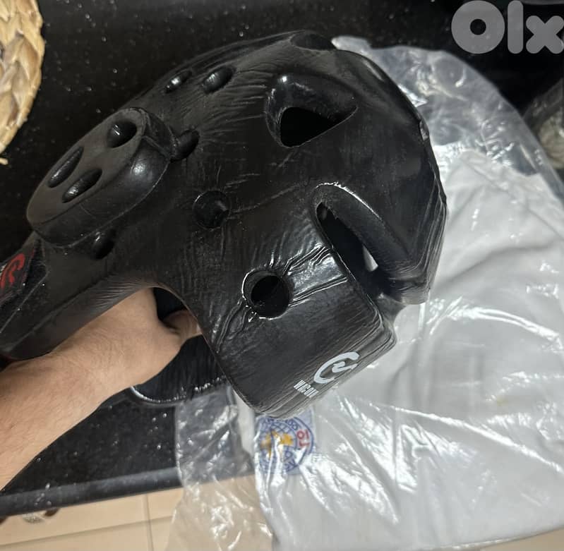 Taekwondo uniform an helmet for sale 0