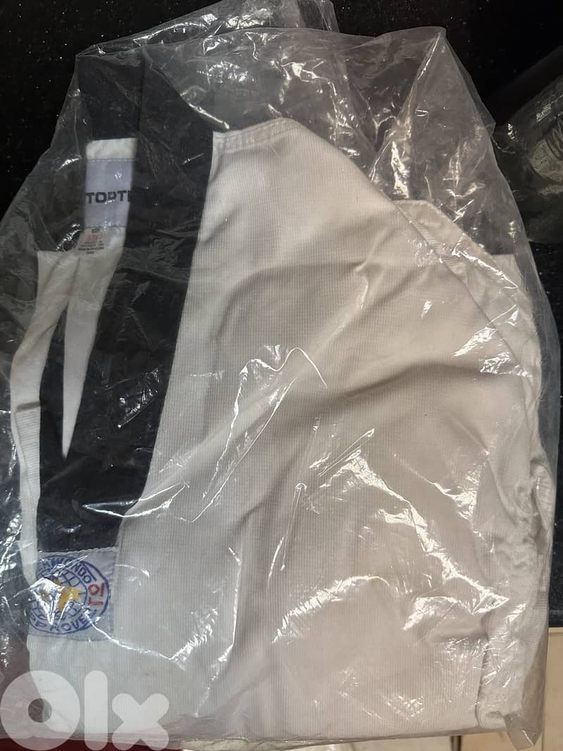 Taekwondo uniform an helmet for sale 1