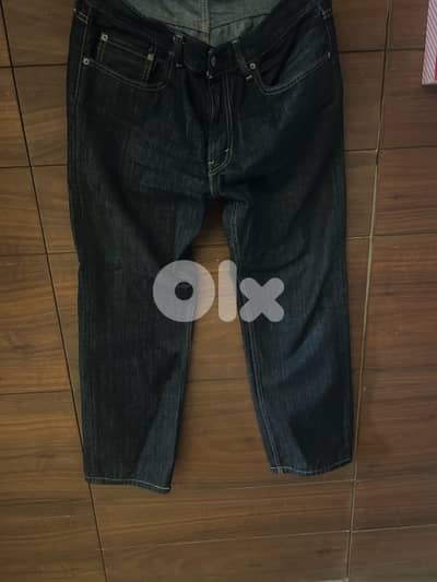 Levi’s dark navy blue jeans