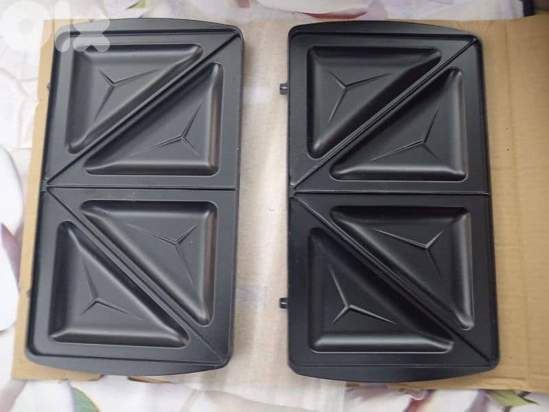 حارة حريك شارع مستشفى بهمن بناية المستقبل طابق ٢ فوق صالون علي علامة 5