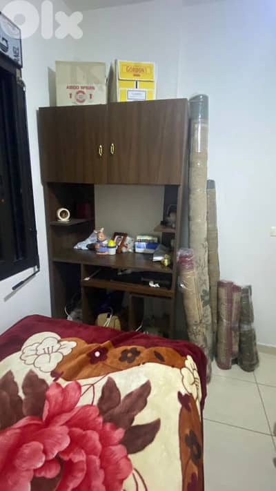 2 beds (1.5 each) with mattresses and a cloffice (closet/office)