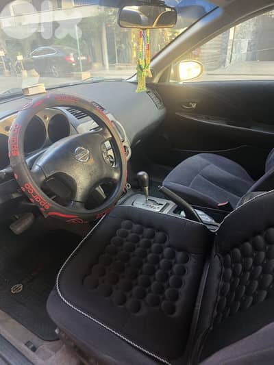 نيسان التيما 2003