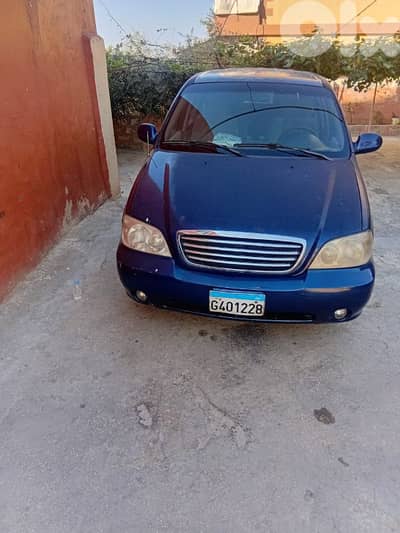 كيا كرنفال 2004