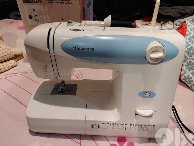 مكنة خياطة 3