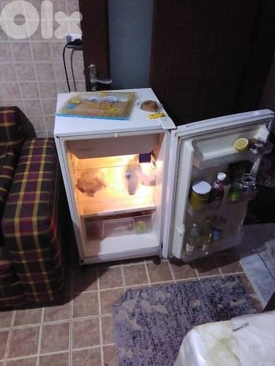 غاز اربع عيون + براد صغير  للبيع بسعر مناسب