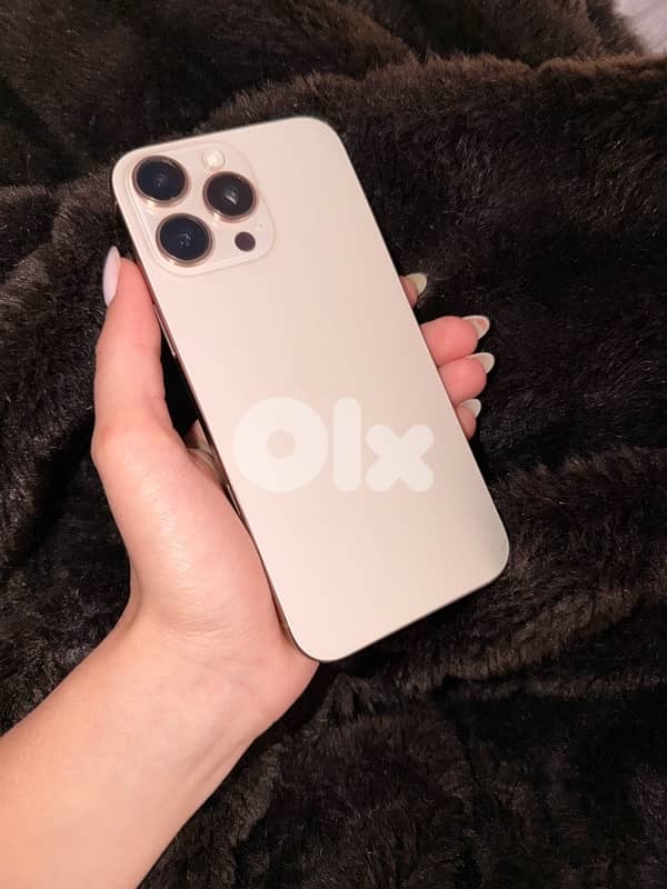 iPhone 16 pro max gold used just 2 month very clean and new 1