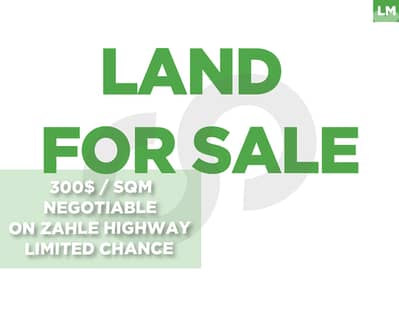 Highway-Front Investment Land in Zahle–under Market Price REF#LM128948