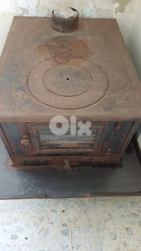 صوبيا حديد حطب  مستعملة بحالة جيدة مع ملقط 0