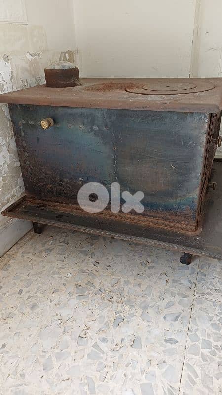 صوبيا حديد حطب  مستعملة بحالة جيدة مع ملقط 1