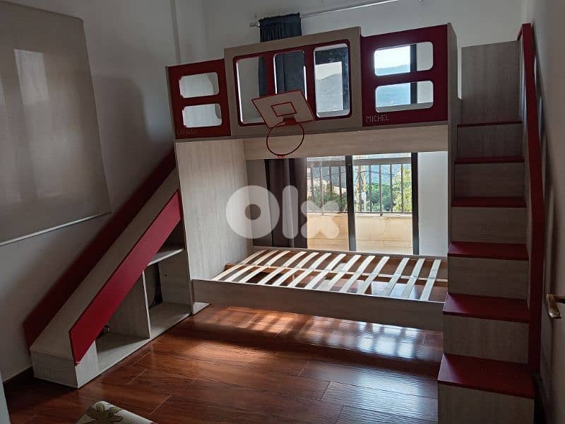 kids bedroom with a slide 0