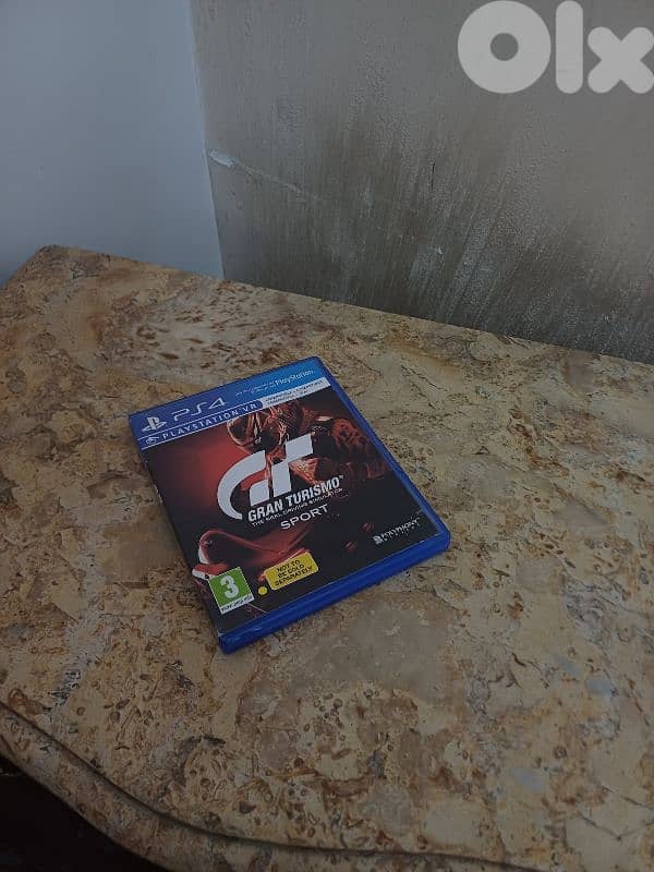 ps4 SLIM 1TB with controlls+cd game 4