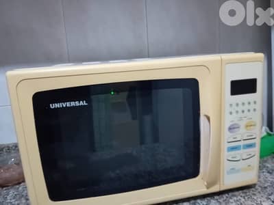 microwave بحالة جيدة