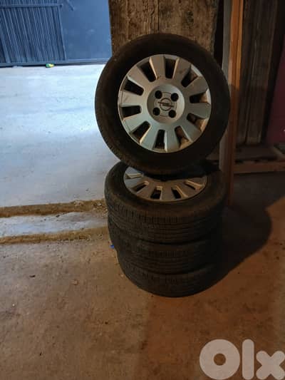 جنوطه مع دواليب جدد 15" للبيع 185/65R15