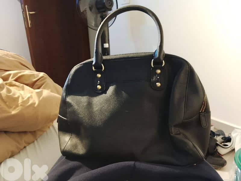 Louis Vuitton, Michael Kors, Yves Saint Laurent 1