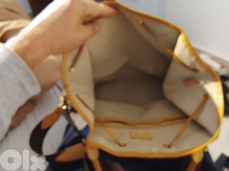 Louis Vuitton, Michael Kors, Yves Saint Laurent 5