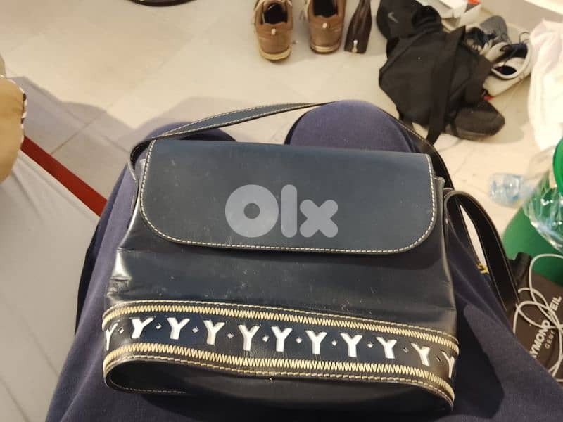 Louis Vuitton, Michael Kors, Yves Saint Laurent 9