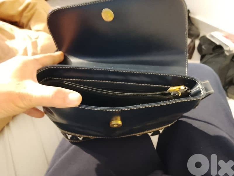 Louis Vuitton, Michael Kors, Yves Saint Laurent 11