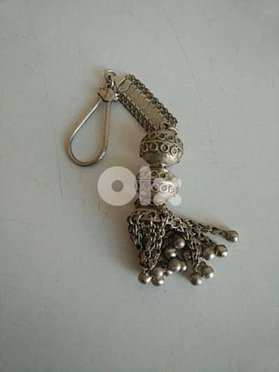 Old silver keychain - Not Negotiable