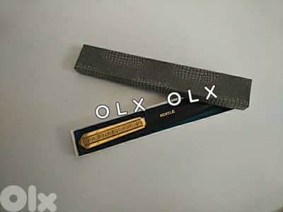 Vintage Nestlé letter opener arabic style - Not Negotiable