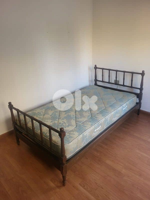 sleep comfort bed and cabinets 0