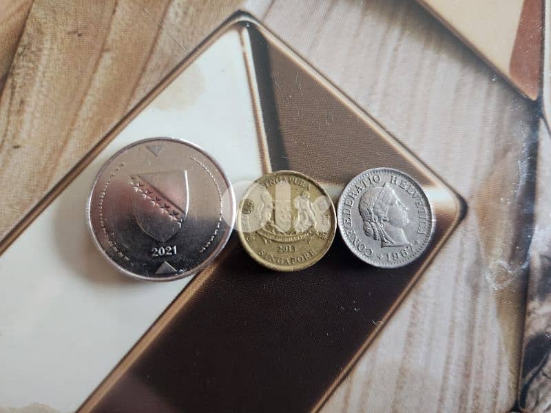 تشكيلة عملات من عدة دول بتواريخ مختلفة 13