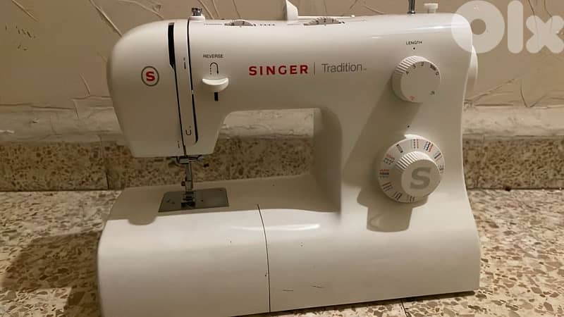 مكنة خياطة 0
