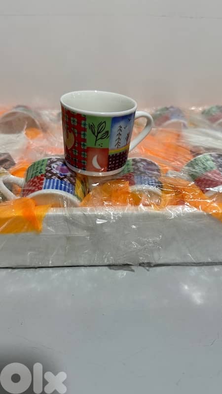 Dozen colored coffee cups - دزينة فناجين قهوة 2