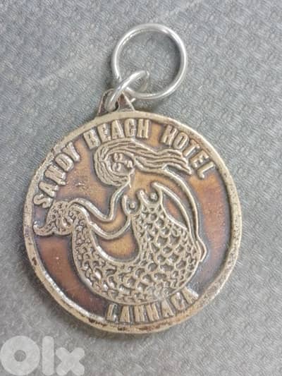 قبرص لارنكا فندق ساندي بيتش ملصق أمتعة برونزية