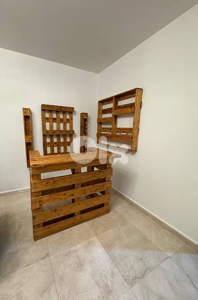 Bar with hanging shelves