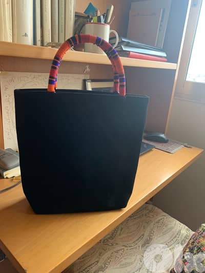 suede bag with beads handles