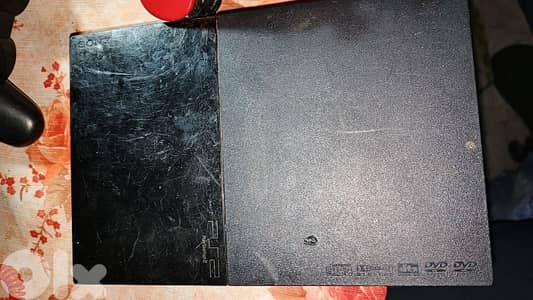 for parts, ps2 slim + 2 controllers + 1 PS3 copy controller