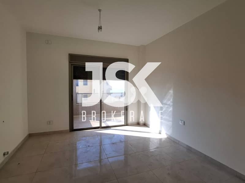 L19851 - Nice Apartment With A Small Terrace For Sale in Jbeil 0