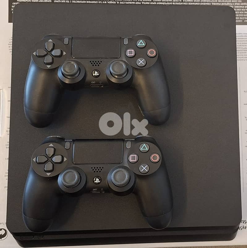 PS4 Slim 500GB (Barely Used) + 2 controllers 0