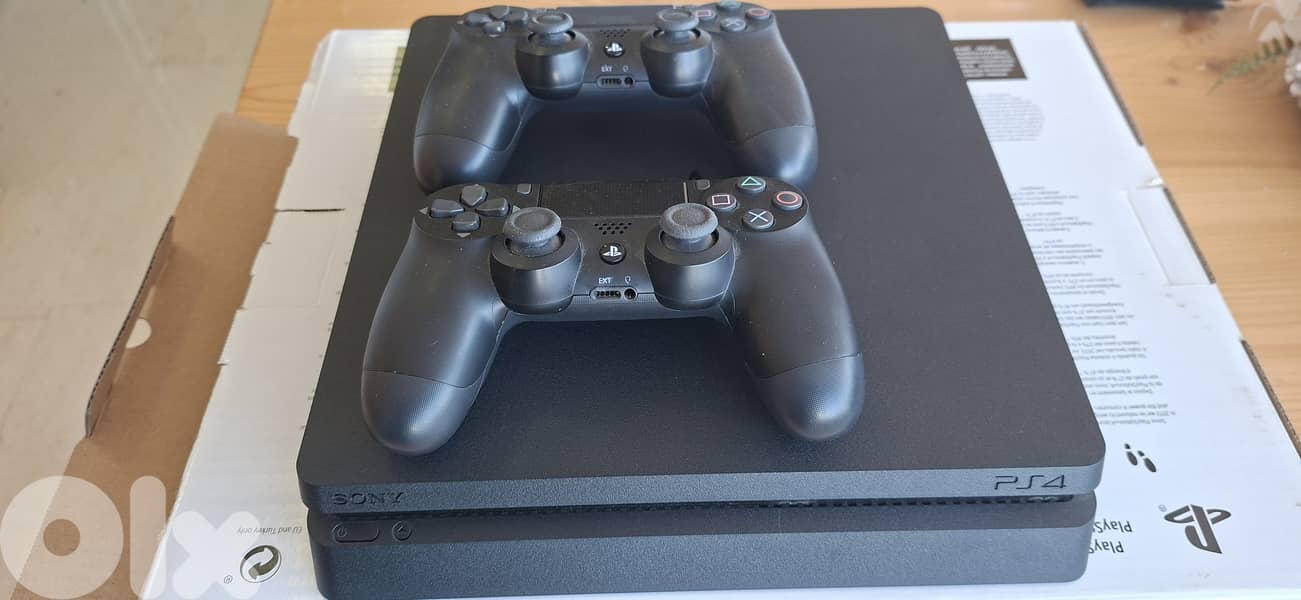 PS4 Slim 500GB (Barely Used) + 2 controllers 1