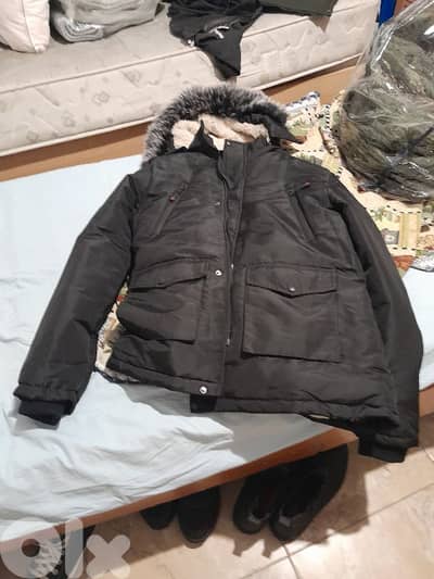 Turkish coat field black with fur capushon.