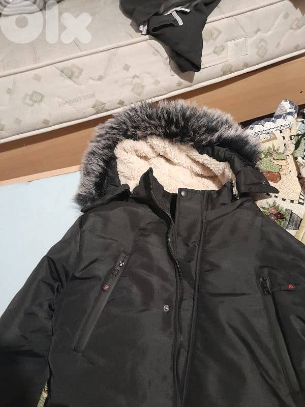 Turkish coat field black with fur capushon. 1