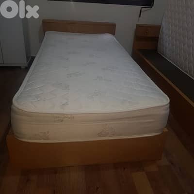 2 wooden beds - used