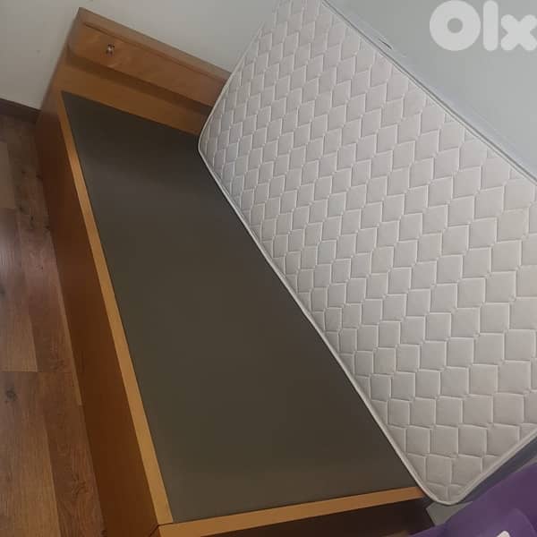 2 wooden beds - used 1