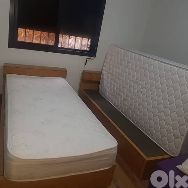 2 wooden beds - used 2