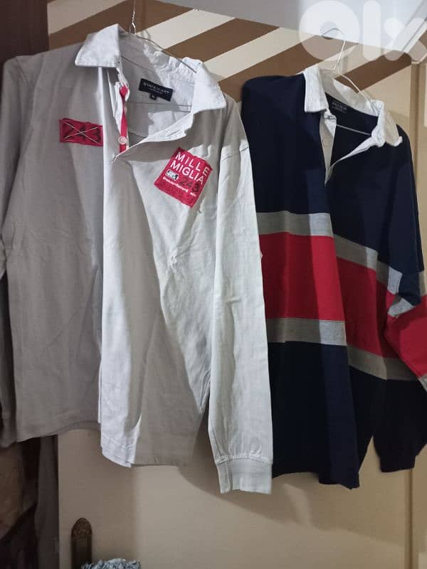 عندي ثياب مستعمله متل يلي بل صوور شروه كنزات وسوتشركم طويل وغير رجالي 1