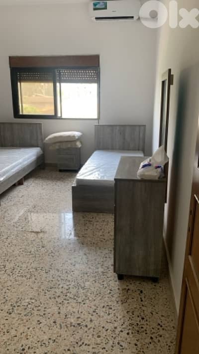 2 beds in a male dorm for rent للرجال أسرة عدد ٢ للإيجار