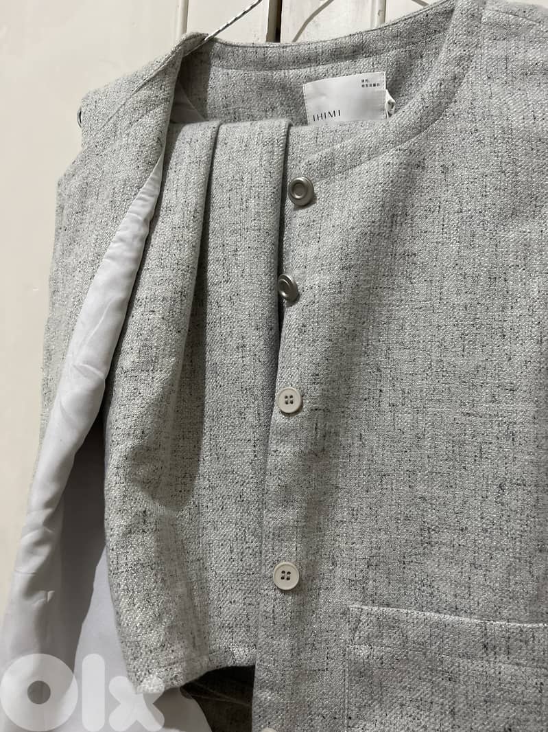 طقم تنورة شتوية + بليزر حفر 0