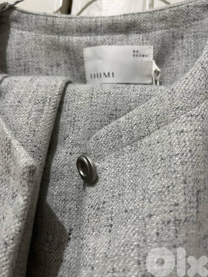 طقم تنورة شتوية + بليزر حفر 1