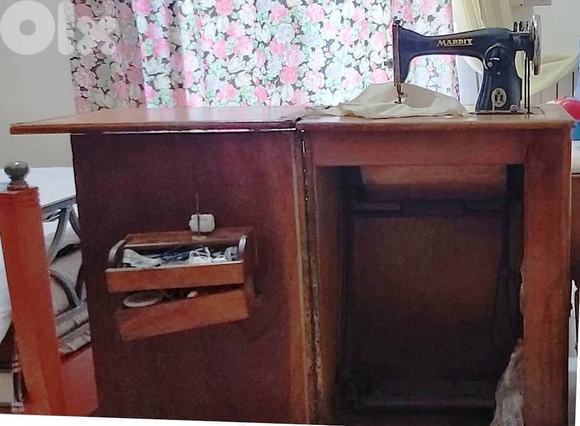 مكنة خياطة 5