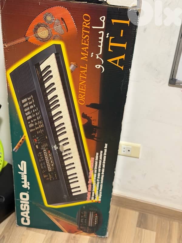 casio AT 1 Oriental piano. with stand & book holder 2