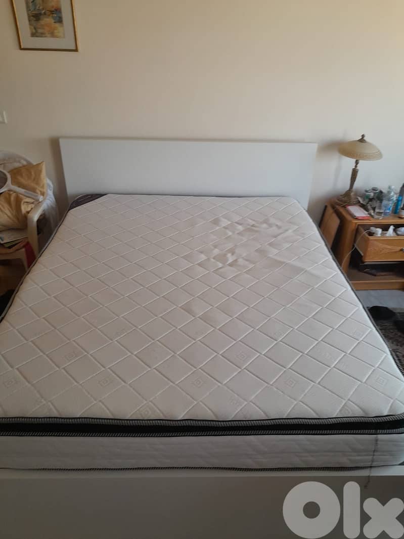 Bed with mattress and bedside table 0