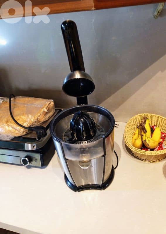 عصارة الحمضيات (Citrus Juicer) 1
