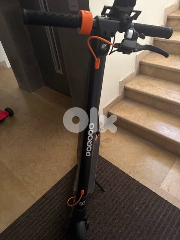 porodo electric scooter with phone stand 2