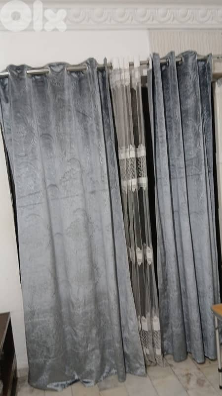 used living room with curtains 3
