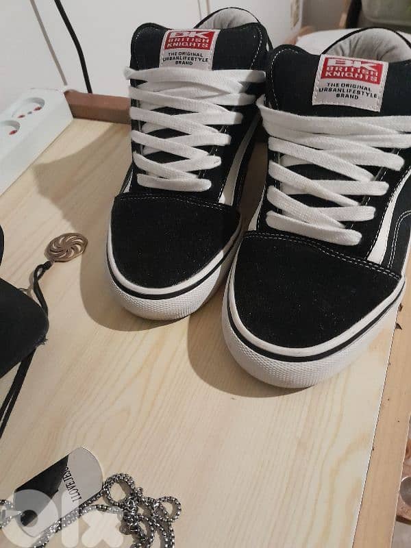 B. K sneakers from (mike sport )like new 2